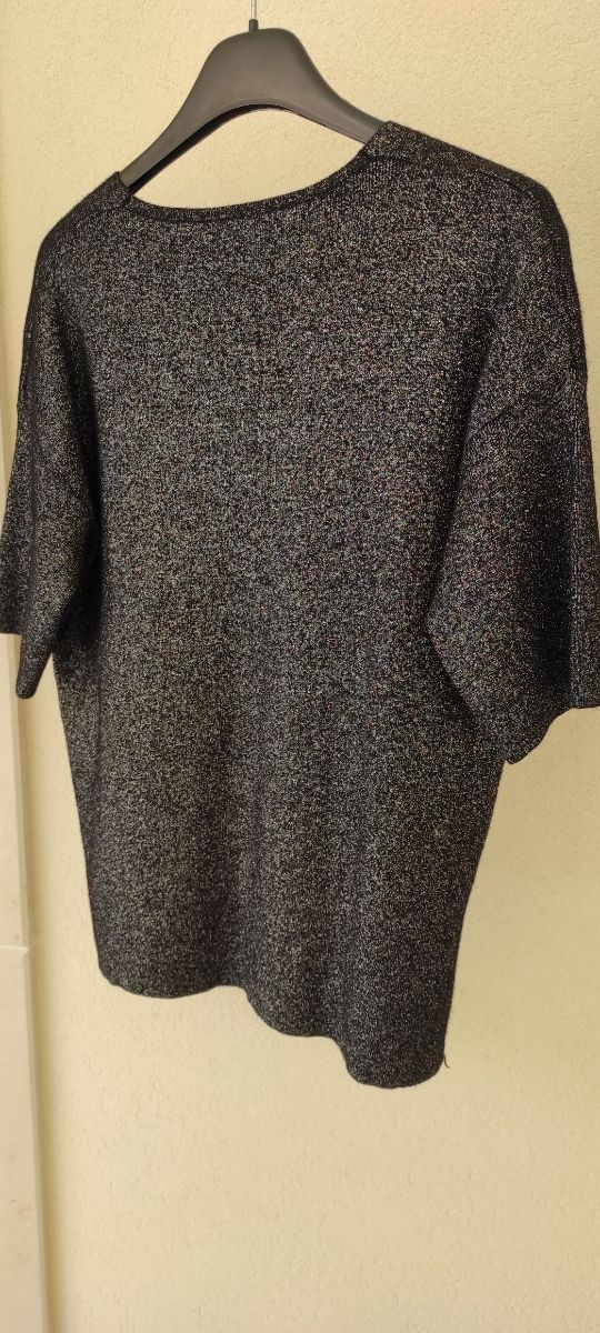 Top elegante nero glitter