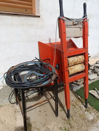 Máquina de vendimiar antigua