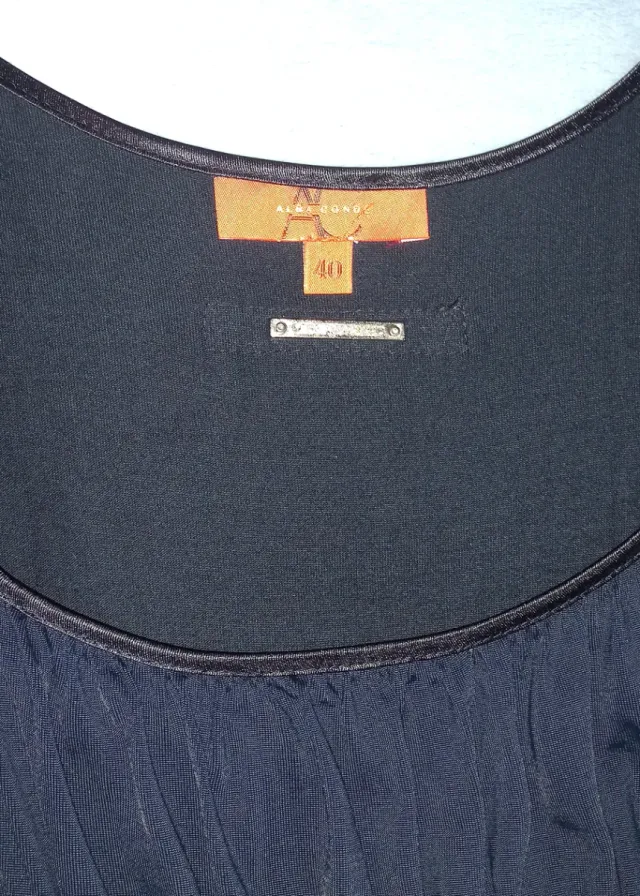 Vestido negro con vuelo.