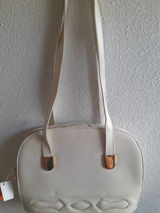 Bolso elegante crudo y dorado