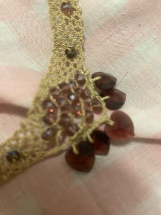 Collar artesanal beige y marrón
