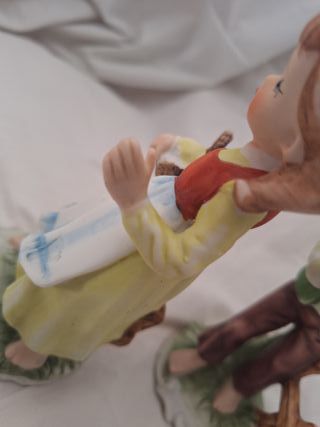 figuras de porcelana pareja de niños