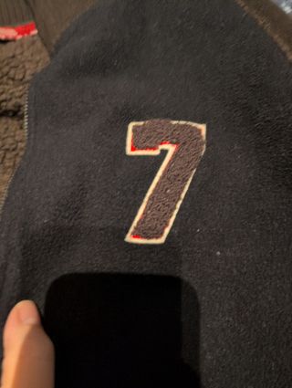 Chaqueta/jersey marrón y negra