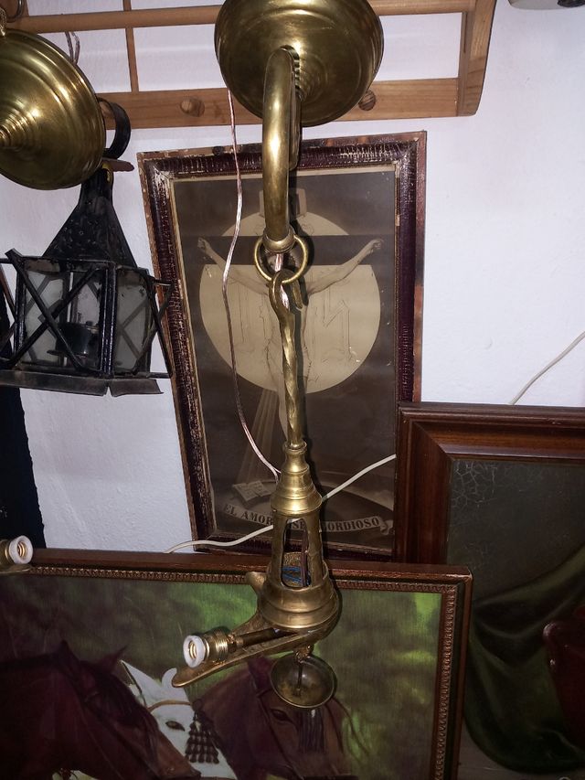 Velones de bronce con luz