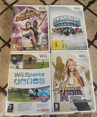 Wii Negra + 4 juegos + Accesorios varios !!!