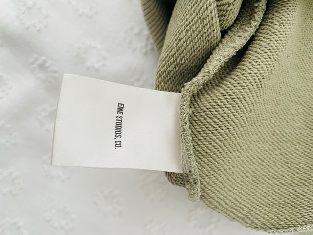 Sudadera EME verde con capucha.Talla M. Está nueva