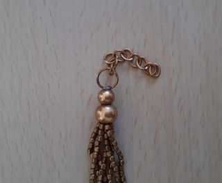 Bracciale con perline in ottone e pietre