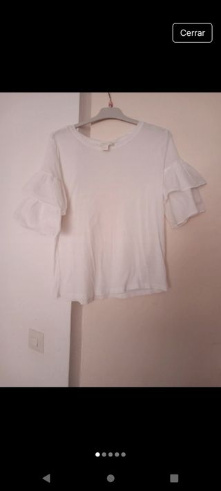 Blusa blanca con volantes  HM
