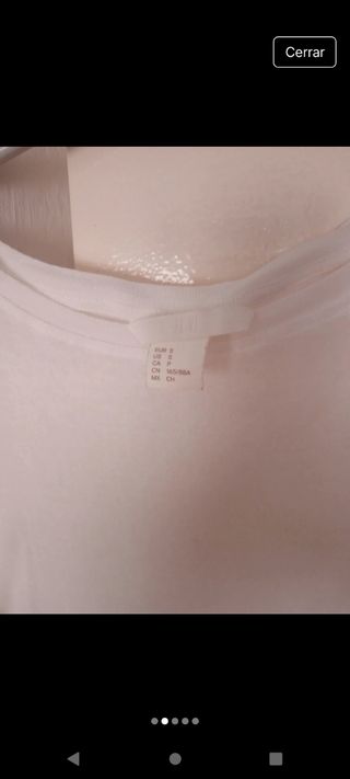 Blusa blanca con volantes  HM