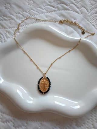 Collar cruz de acero nueva