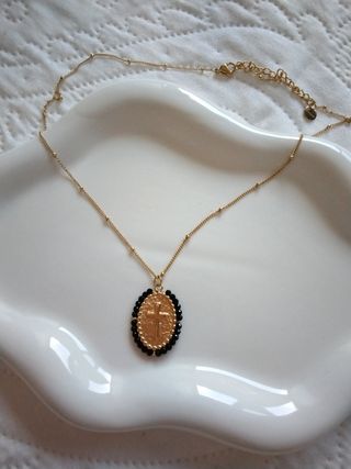 Collar cruz de acero nueva