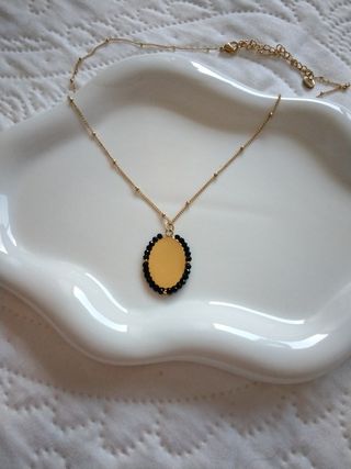 Collar cruz de acero nueva