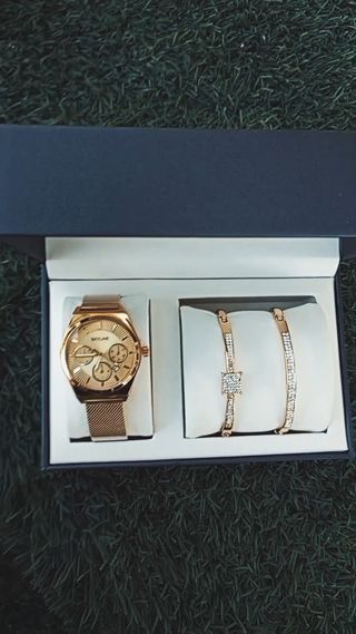 Reloj Skyline dorado con 2 brazaletes