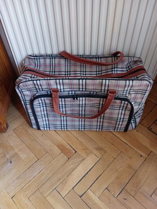 Bolsa de equipaje grande.