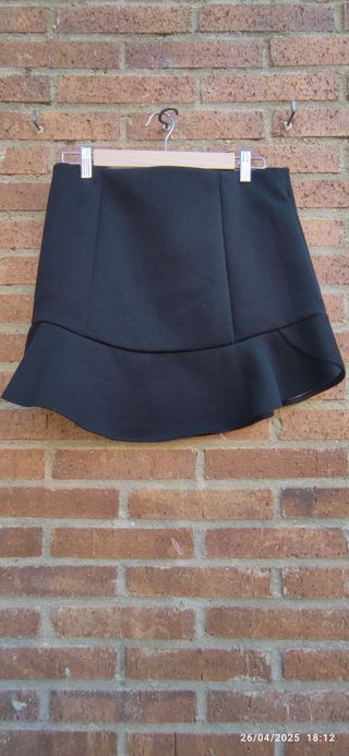 Minifalda negra vuelo