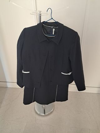 Vestido años 60 azul marino con chaqueta a juego.