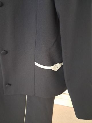 Vestido años 60 azul marino con chaqueta a juego.