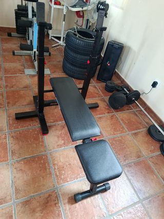 Banco press + mancuernas (102kg)