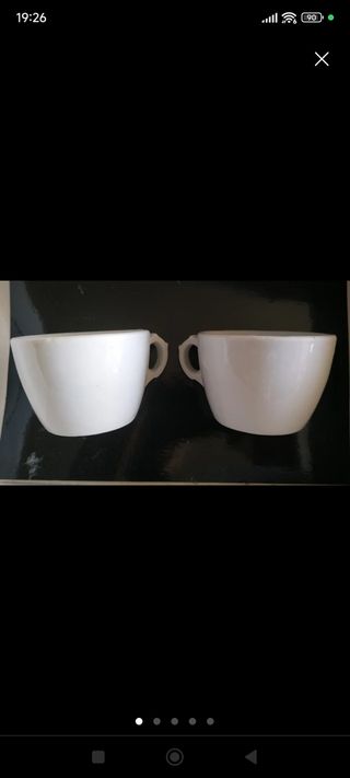 Dos tazas de Santa Clara y platillos
