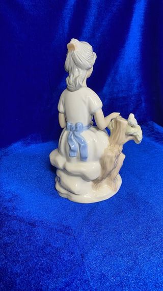 Figura Sanbo Mujer con pájaro. Colecciónistas.