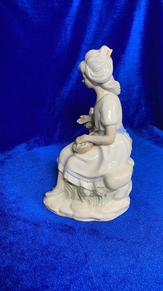 Figura Sanbo Mujer con pájaro. Colecciónistas.