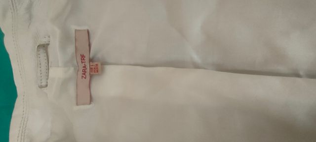 Cazadora piel blanca mujer