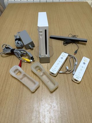 Cónsola Wii, tabla, mandos,juegos.