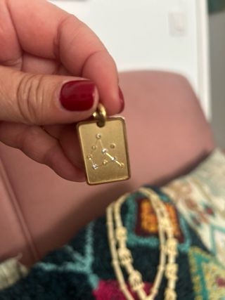 Medalla dorada horóscopo y Constelación Sagitario