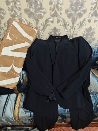 Traje