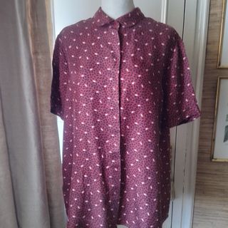 Camisa seda natural UTERQÚE. 