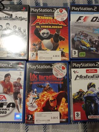 PlayStation 2 con mandos y juegos