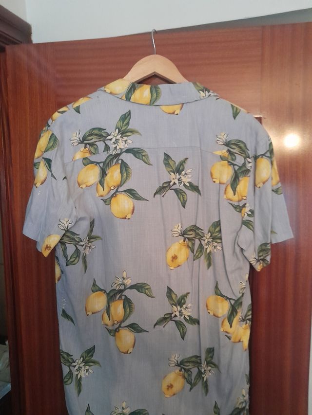 Camiseta tirantes deportiva amarilla y negra