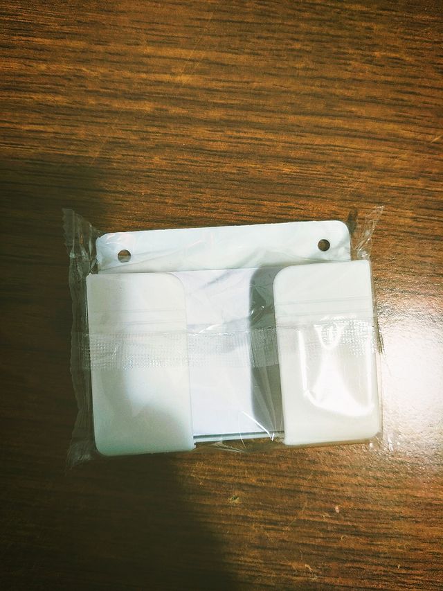 Supporto da parete per cellulare