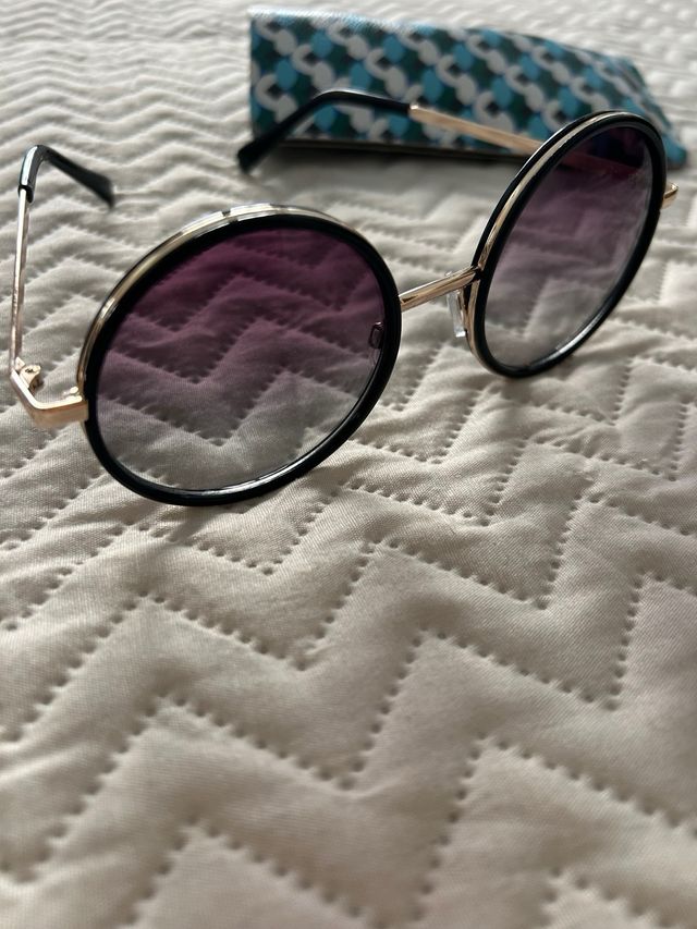 Gafas sol redondas negras