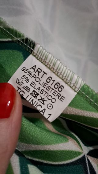 Giacca verde con disegni geometrici