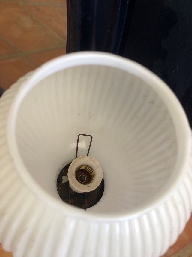 Espejo ovalado negro con 2 apliques