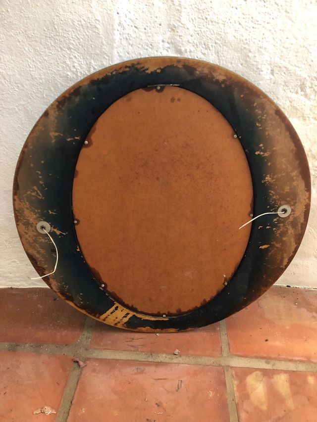 Espejo ovalado negro con 2 apliques