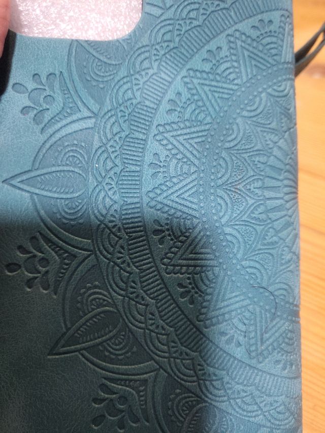 Funda móvil turquesa con mandala