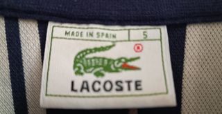Polo de rayas verticales ”Lacoste”. Talla 5.