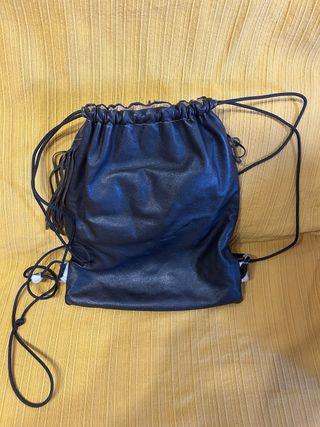 Mochila flecos piel