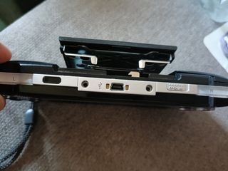 PSP + funda + 11 juegos