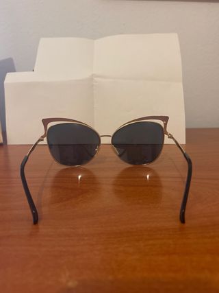 Gafas sol doradas efecto espejo