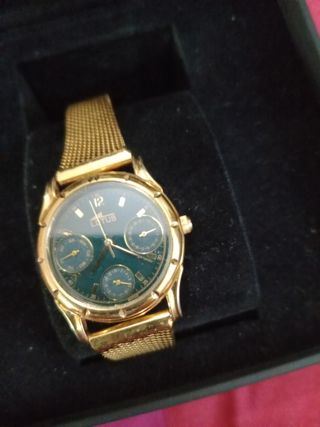 Reloj Lotus dorado