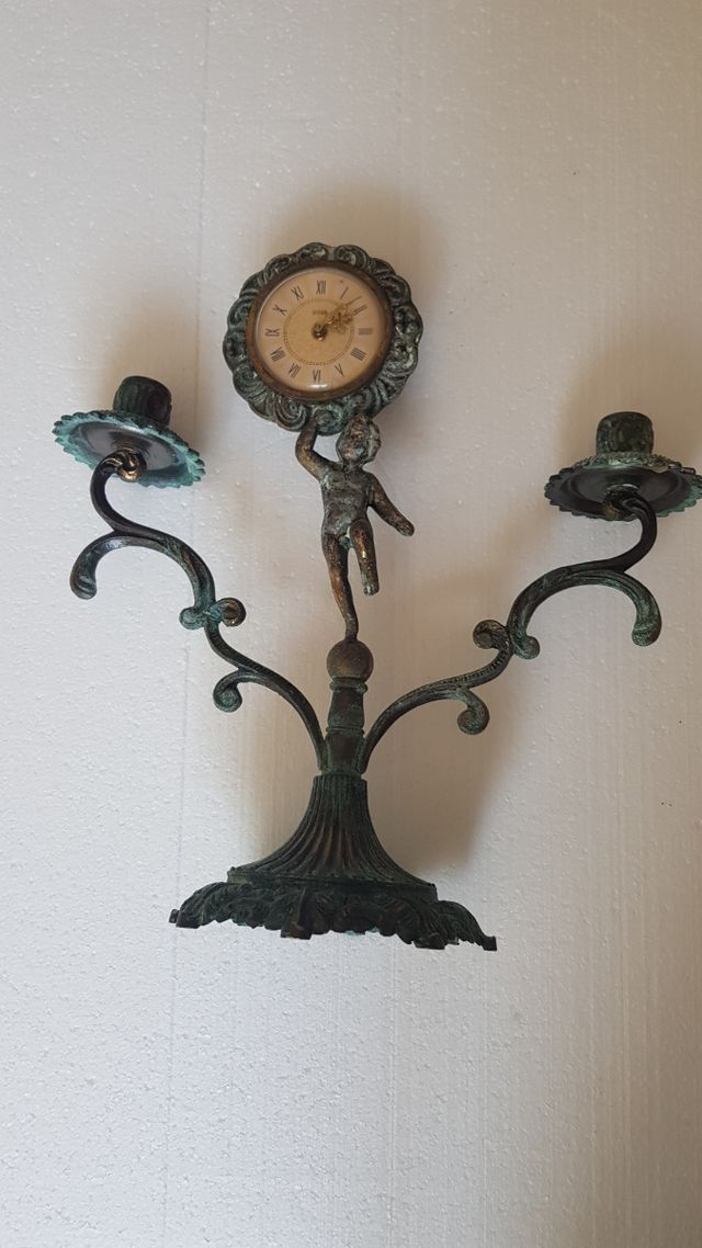 Portacandele antico in bronzo