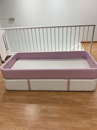 Cama nido rosa y blanca