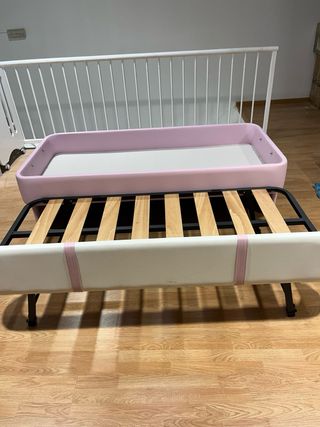 Cama nido rosa y blanca