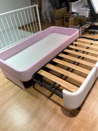 Cama nido rosa y blanca