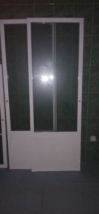 Puerta doble corredera climalit
