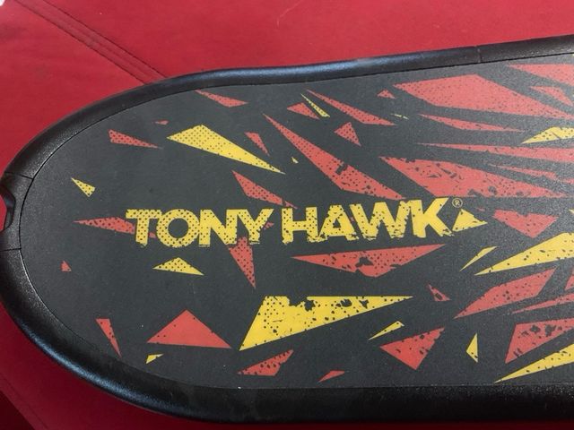 Juego  y tabla Tony Hawk psp3