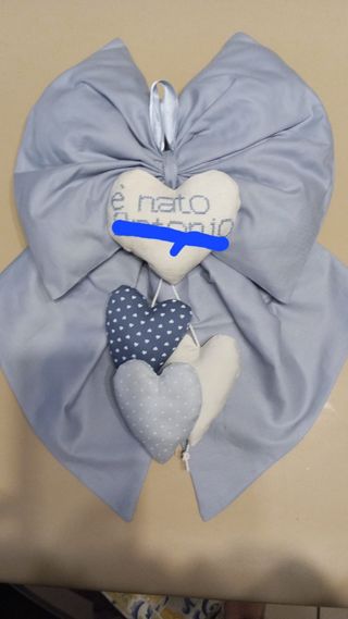 Fiocco nascita celeste con cuori